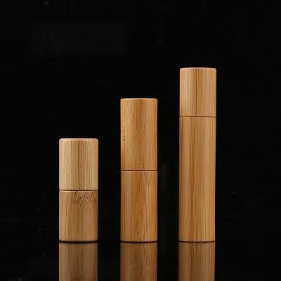 Trail size transparent glass bamboo round cosmetic manufacturers serum cream roll on perfume bottle wholesale